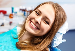 Smiling woman in dental chair