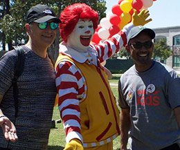 Team members posing with Ronals Macdonald