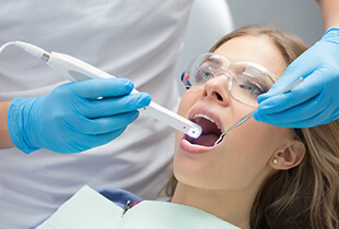 Woman receiving intraoral photos