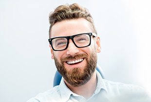 Smiling man in dental chair