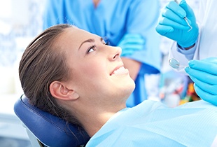 Smiling woman in dental chair