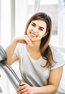 smiling woman in dental chair in Sierre Madre