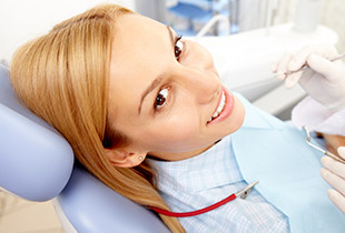 Smiling woman in dental chair