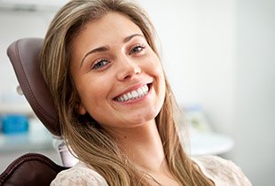 Smiling woman in dental chair