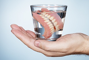 Dentures in a glass of water