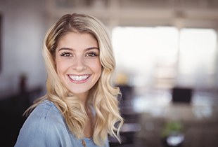 woman smiling after getting veneers in Arcadia