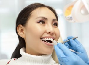 Female patient receiving dental care