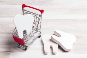 carvings of teeth in a shopping cart