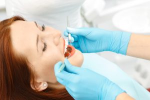 Woman receiving dental care