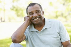 older man smiling with nice teeth