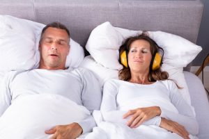 man snoring needs to visit sleep dentist in Arcadia, CA